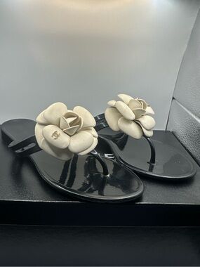 CHANEL Black Jelly Thong Sandals with Cream Camellia